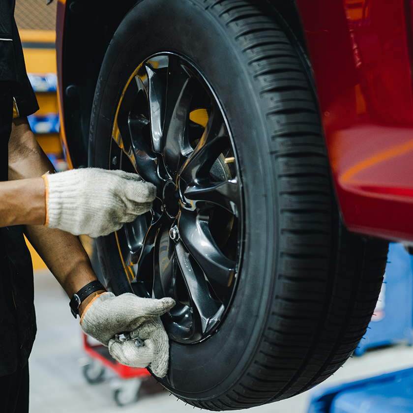 Technician changing tire